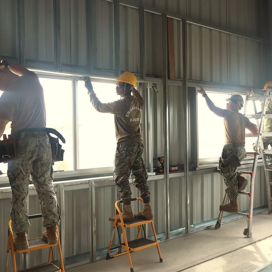 Steel stud wall framing going up inside a building