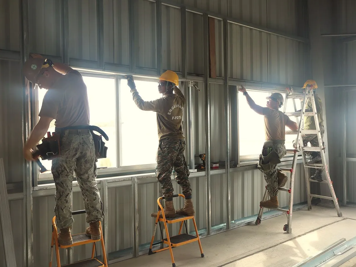 Steel wall framing going up inside a building